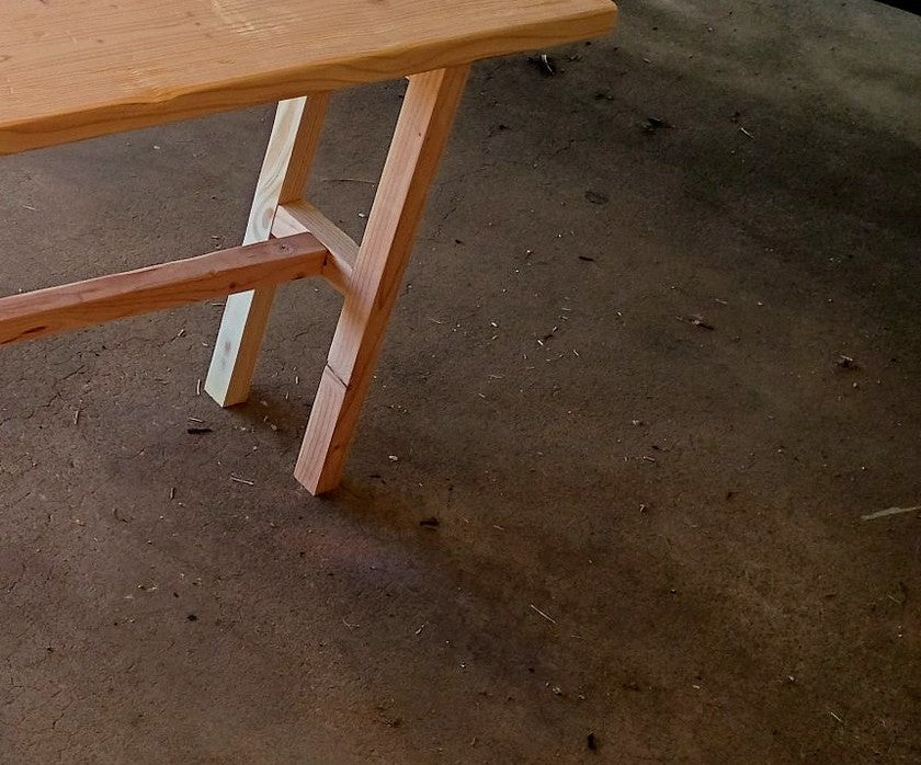 Rustic console table, 6 ft, close-up of the top and leg joint
