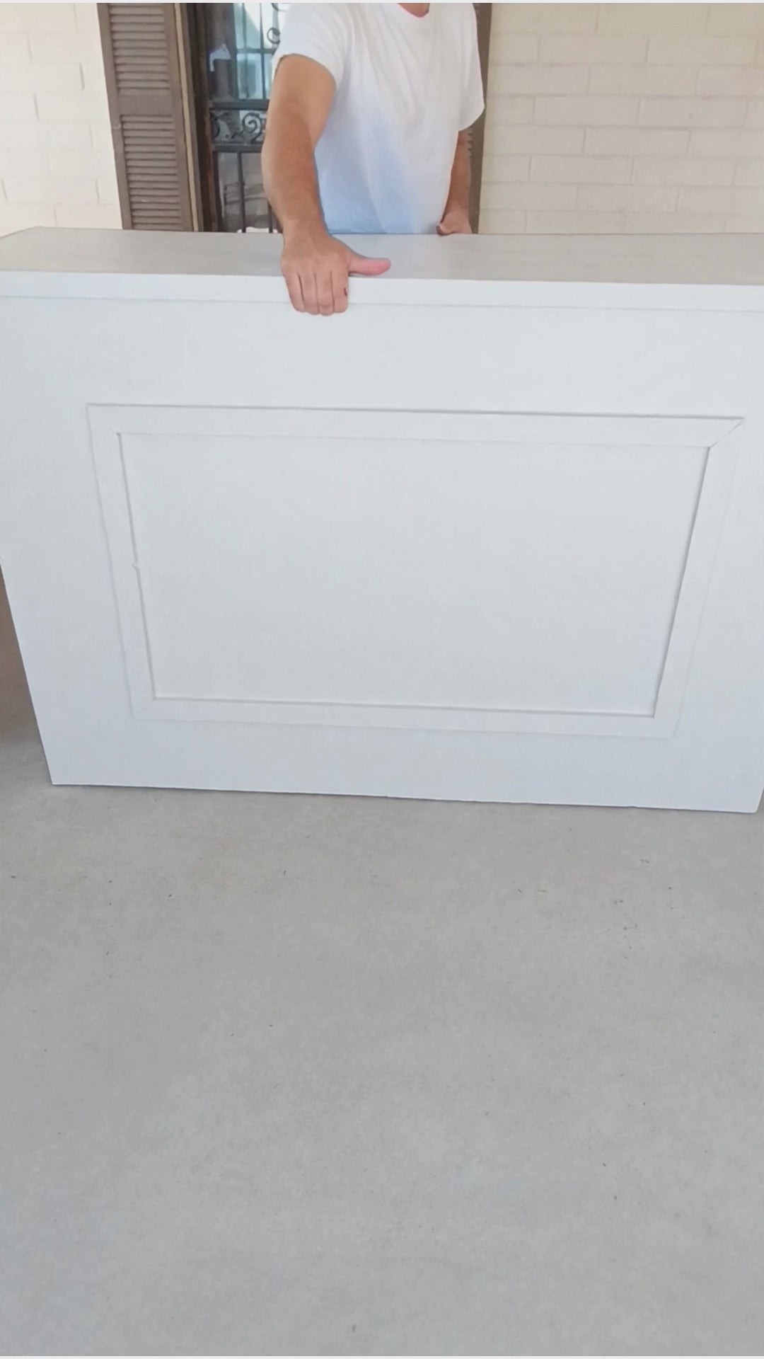 Watch the portable bar break down flat, piece by piece